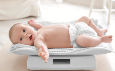 Baby on weighing scale